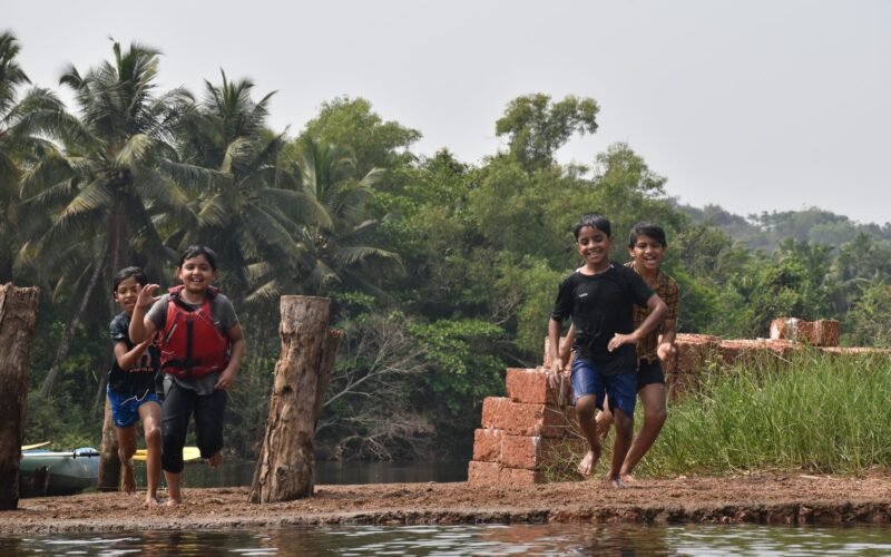 Kids about to jump to water